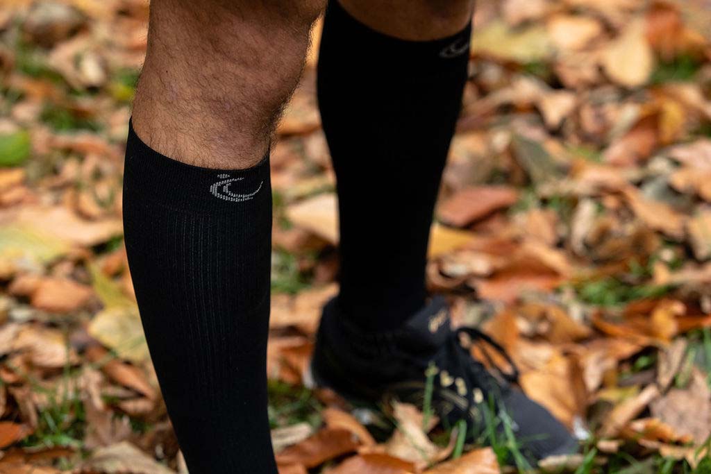 Black sports compression socks for running front